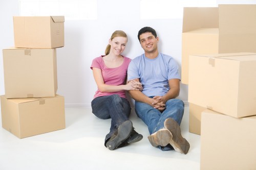 Local team handling household items during an Ealing move