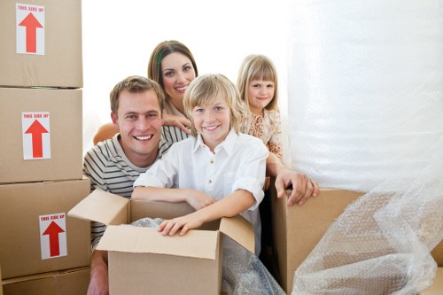Packed moving boxes ready for removal services in Ealing