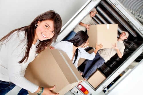 Packed boxes and furniture ready for a local house move