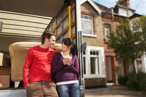 Packed boxes and furniture ready for removals in a West London property